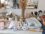 a table with many items on it in a room