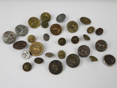 several different types of coins on a white surface with a coin in the middle