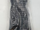 an image of a plastic bag with a pair of scissors in it