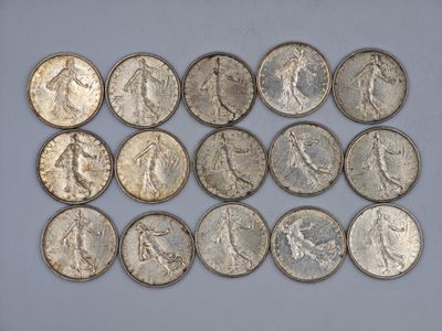 a close up of a bunch of coins sitting on top of a table