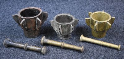 several different types of metal items are sitting on a blue carpet
