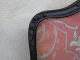 a black frame with a picture of a cat on it