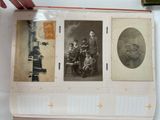 an old photo of a man and two children