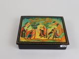 an image of a box with a painting on it on a white surface