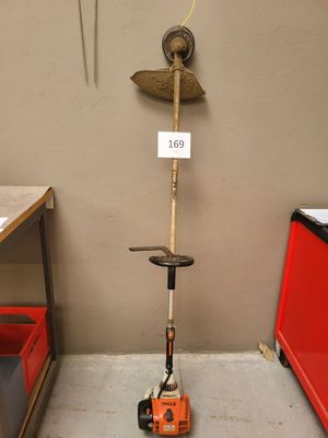 a small machine that is sitting in the corner of a room