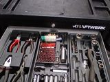 many tools in the tool box on the table