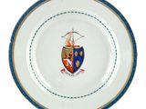an image of a plate with a coat of arms on it