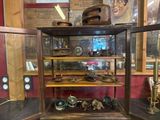a display case with a lot of items inside of it
