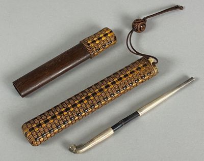 three different types of canes and a cane holder on a table