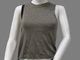 an image of a mannequin wearing a metallic top