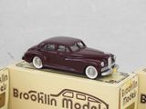a toy car sitting on top of a box of boxes