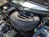 an image of a car engine with its hood open