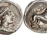 une pièce d'argent sur laquelle figurent une femme et un lion