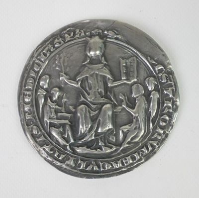 an image of a silver coin with a picture of a man and a woman