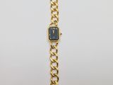 an image of a gold watch with a blue face
