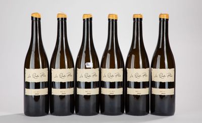six bottles of wine are lined up in a row