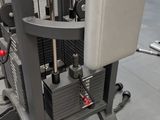 a machine that is sitting on the floor in the gym