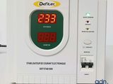 an image of a digital temperature controller on a white surface