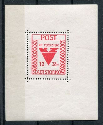 the stamp is red and white with a triangle on it