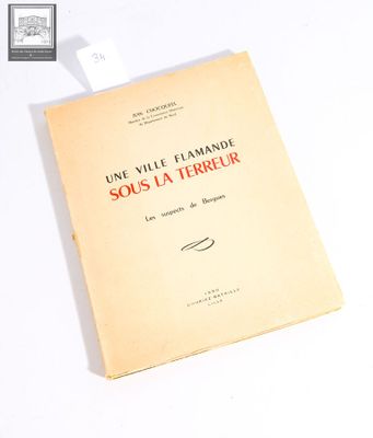 a book that is sitting on a white table