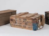 three wooden boxes sitting next to each other on a white surface