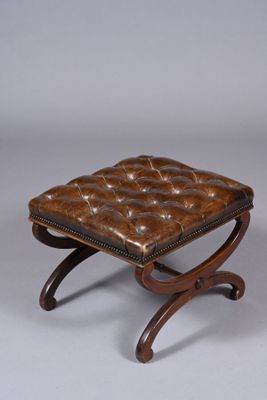 leather foot stool with wooden frame and foot rest