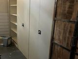 a room that has a bunch of cabinets in it