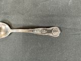 a spoon that is sitting on a table