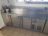 a stainless steel counter in a commercial kitchen