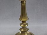 pair of antique brass candlesticks with green and white floral designs