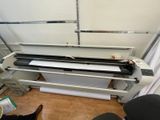 a machine that is sitting on the floor in a room