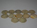 a lot of coins that are on the table