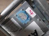 a close up of a piece of metal with a sticker on it