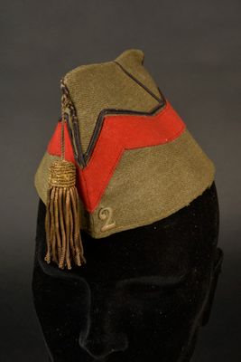 une image représentant un chapeau surmonté d'un pompon