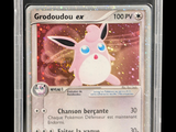 the card is in a clear plastic holder with a white pokemon character on it