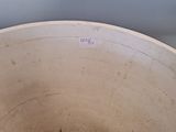 a white bowl with some food inside of it