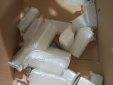 a box full of plastic bottles and other items in it