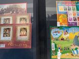 a picture of a window with a lot of stamps on it