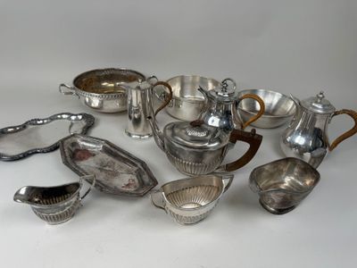 silver plated tea and coffee set on a white background