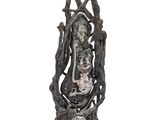 statue of a woman holding a clock in her hands
