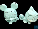 two ceramic figurines of a mouse and a cat