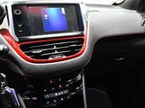 a dashboard of a car with a digital display