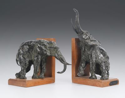 pair of bronze elephant bookends on wooden bases