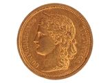 l'image d'une pièce d'or sur laquelle figure le visage d'une femme