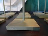 a lot of white stands that are on a table