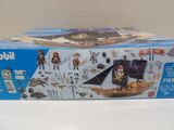 a box of playmobil with a pirate ship on it