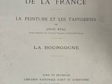 an old book with a black and white image of the title of the book
