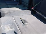 a remote control in the back seat of a car