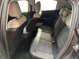 the back seats of a car are empty and the passenger seats are empty