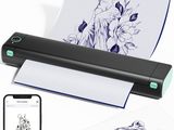 une photo en noir et blanc d'un téléphone à côté d'un rouleau de papier